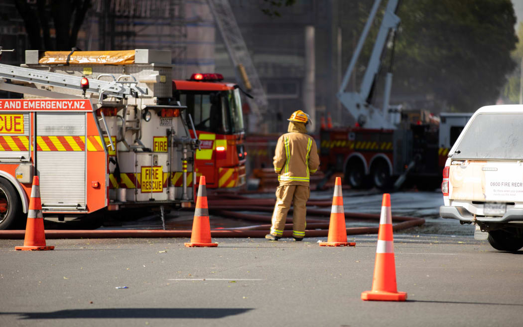 A firefighter on the scene in the Auckland CBD.