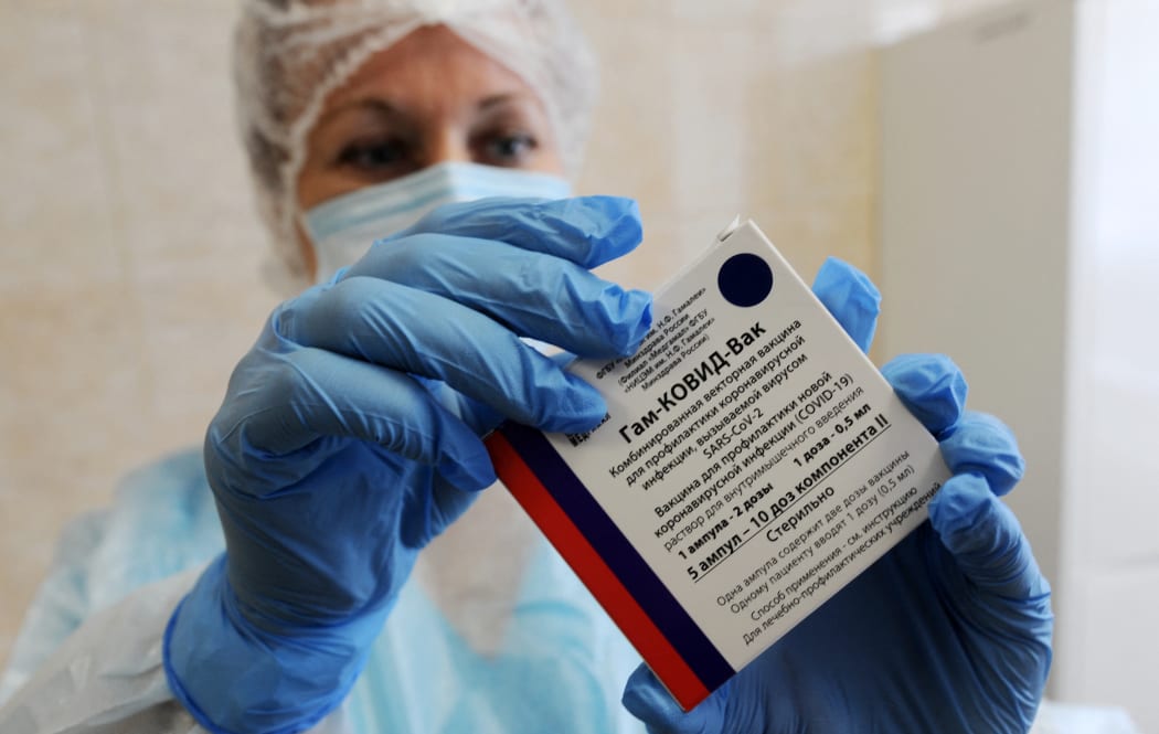 A medic demonstrates a package of Russia's Gam-COVID-Vac, trade-named Sputnik V coronavirus vaccine, in the Gorelskaya outpatient clinic of the Tambov Central District Hospital, in the village of Goreloe, Tambov region, Russia.