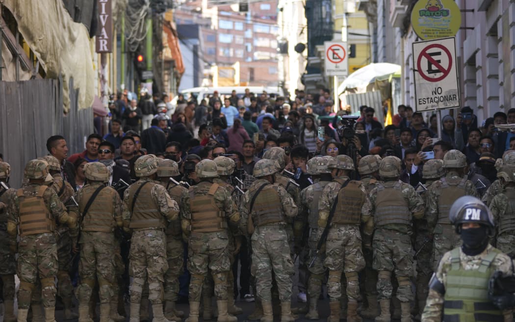 Military police block entry to Plaza Murillo in La Paz, Bolivia, on 26 June 26, 2024. Armored vehicles rammed into the doors of the government palace located in Plaza Murill, earlier in the day.