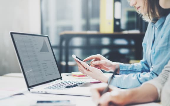 Team succes. Photo young business crew working with new startup project. Notebook on wood table.  Analyze plans hands, keyboard.