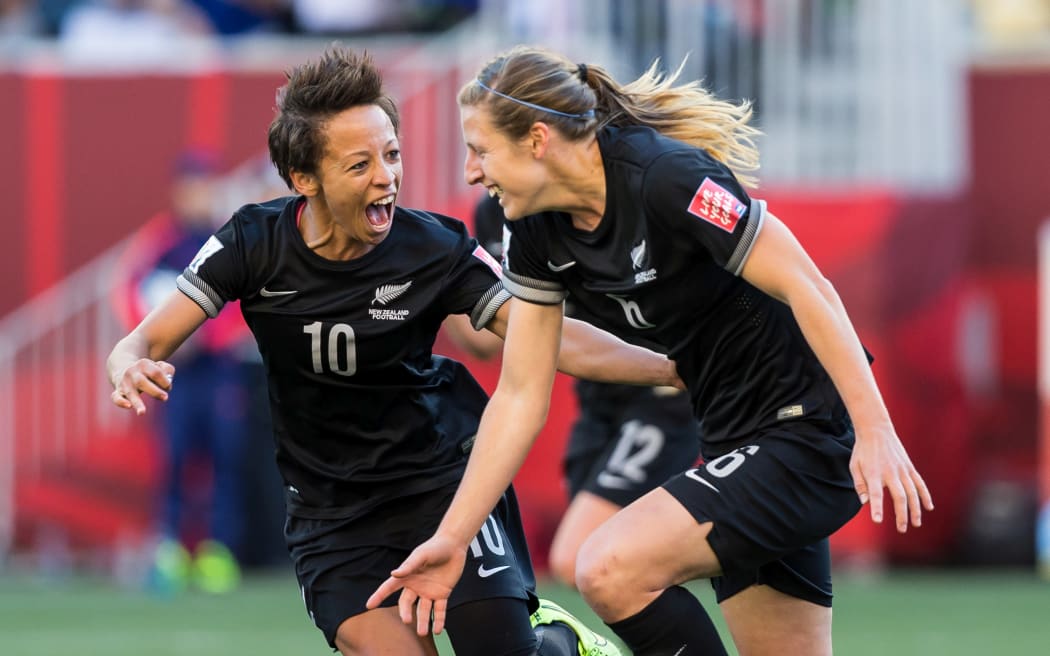 Rebekah Stott (right) and Sarah Gregorius celebrate a goal against China in 2015.