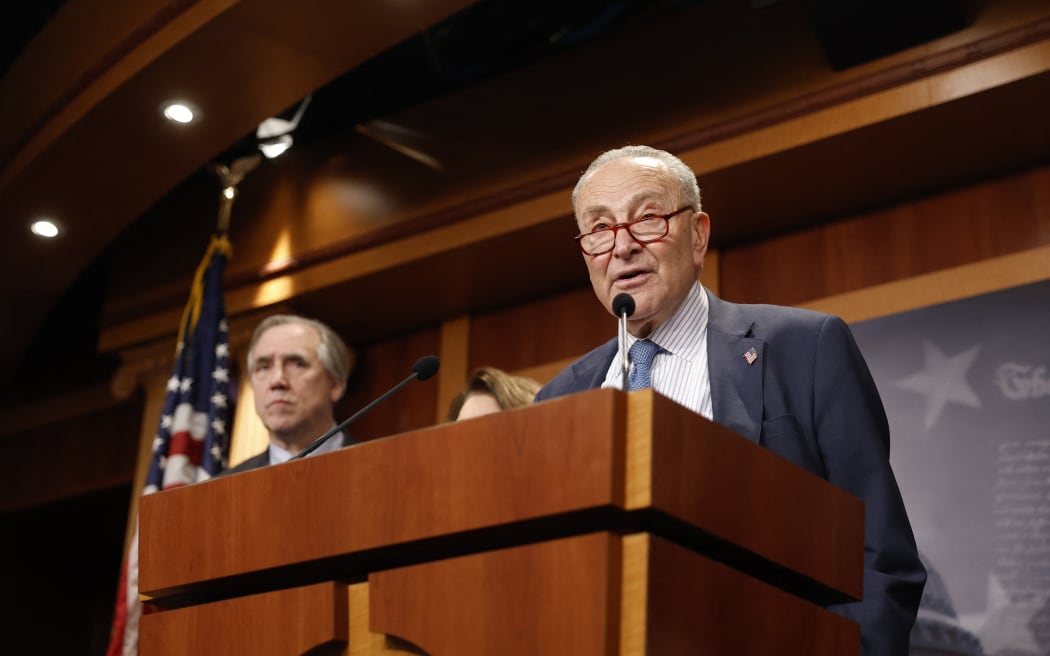 WASHINGTON, DC - JANUARY 28: U.S. Senate Minority Leader Chuck Schumer (D-NY) speaks alongside Sen. Jeff Merkley (D-OR), at the U.S. Capitol Building on January 28, 2025 in Washington, DC. The Senate Democrats held the news conference to discuss a range of recent actions taken by U.S. President Donald Trump's administration, including the pardoning of January 6th rioters and the Office of Management and Budget’s pause for federal agencies to provide financial assistance.   Anna Moneymaker/Getty Images/AFP (Photo by Anna Moneymaker / GETTY IMAGES NORTH AMERICA / Getty Images via AFP)