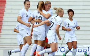 Football Ferns celebrating a goal