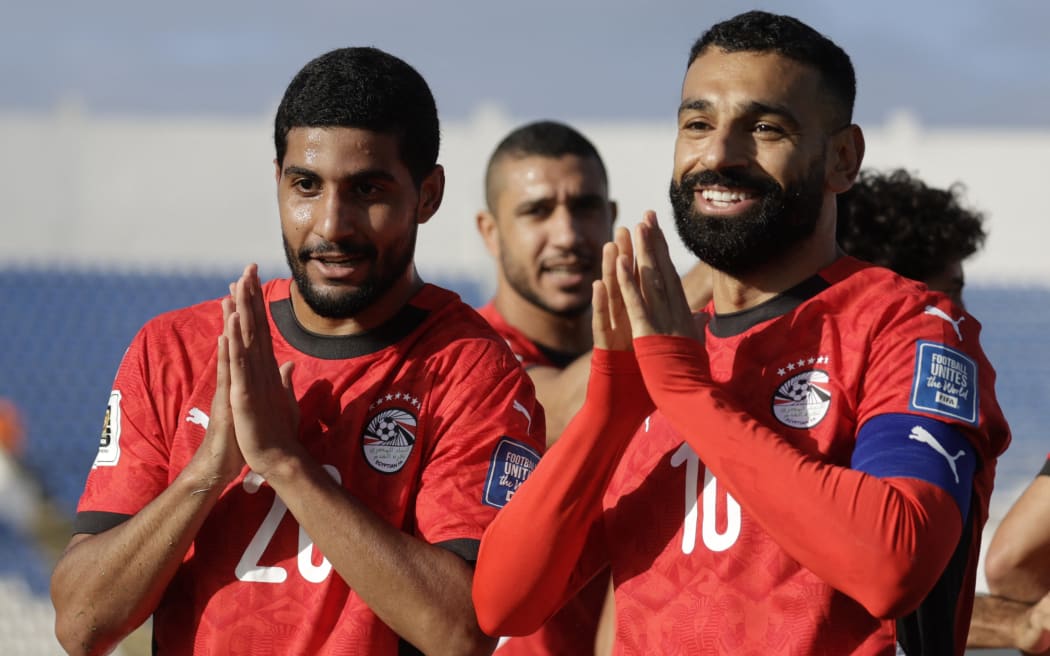 Egypt's forwards Ibrahim Adel and Mohamed Salah celebrate during FIFA World Cup qualifying.