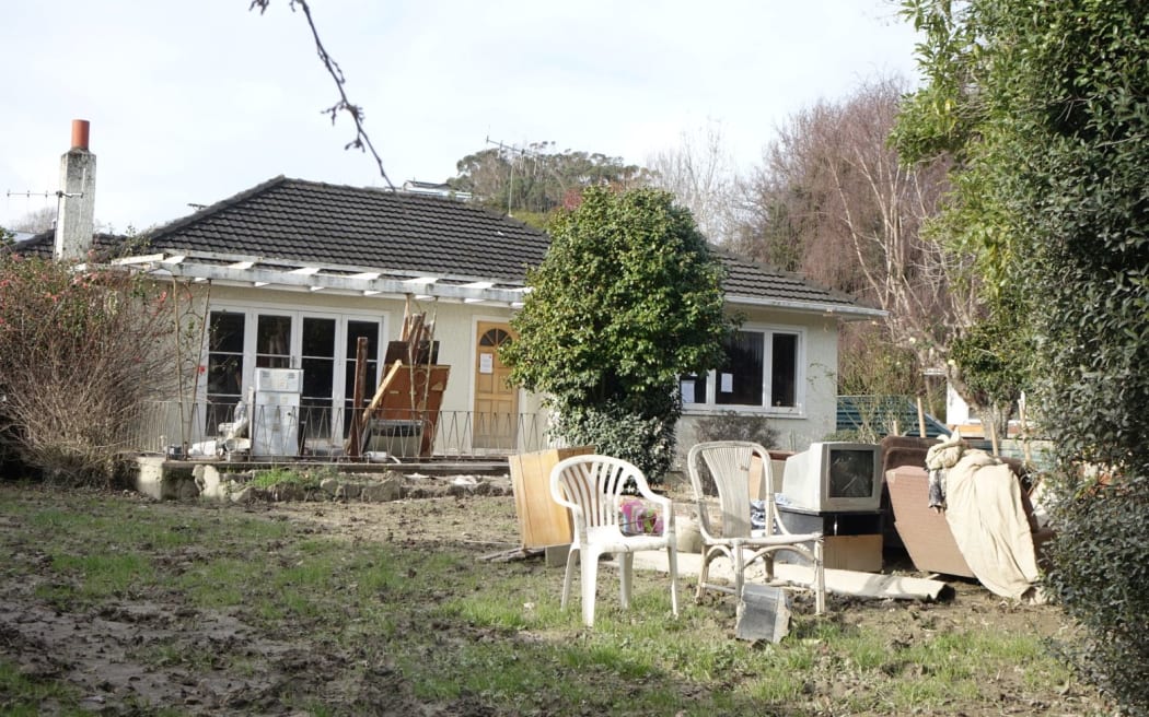 A flood damaged home on Anzac Parade.