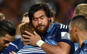 The Blues stand-in captain Steven Luatua with team-mates.