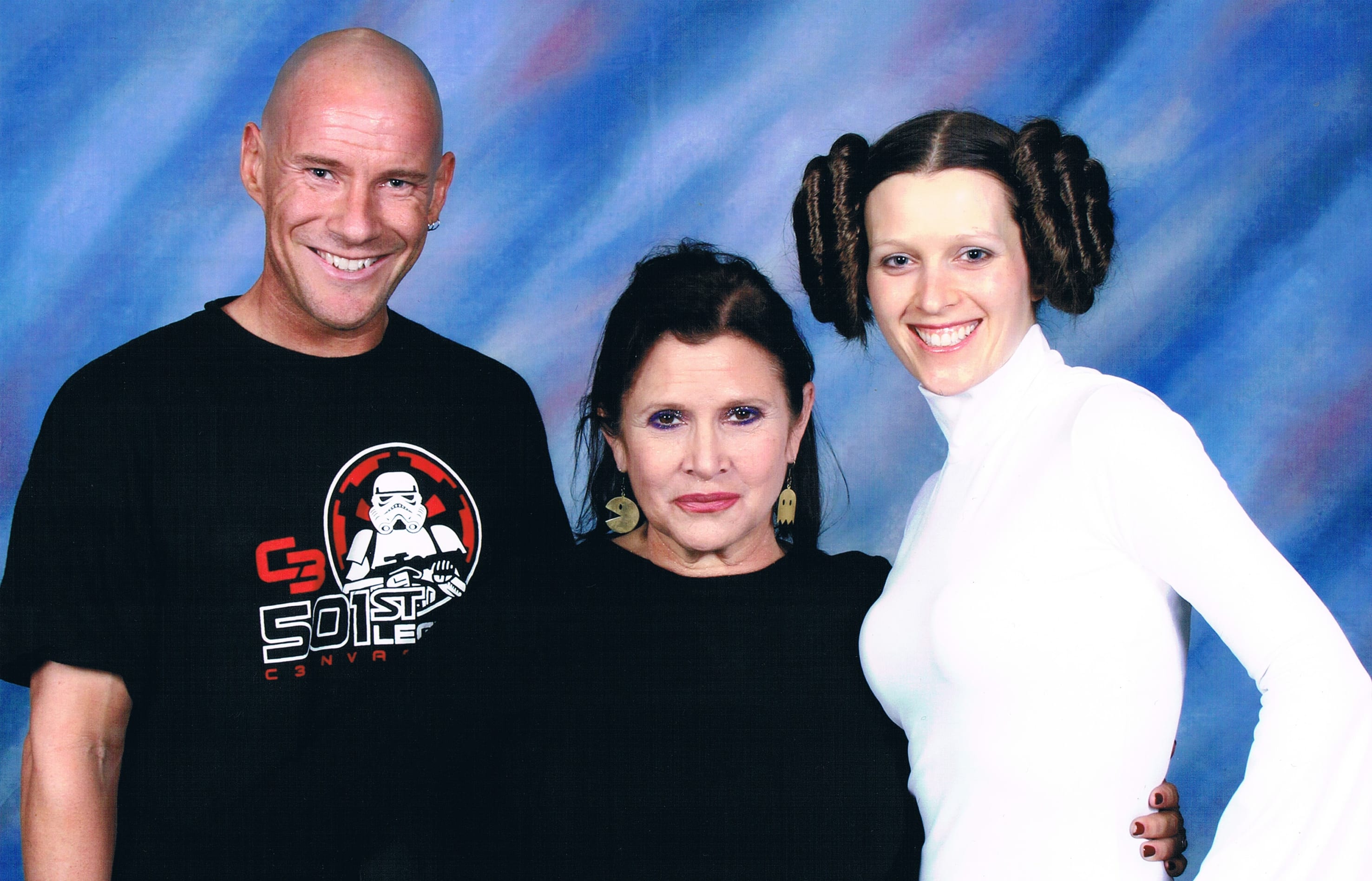 New Zealand Star Wars fans Matt ad Kristy Glasgow with Carrie Fisher in 2011.