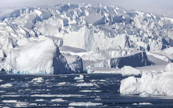 Iceberg and large fragments of drifting ice, here iceberg floating in front of the Antarctic Peninsula, climate melting global warming. Marguerite Bay, George VI Channel. Expedition below the South Polar Circle in Antarctica (Photo by Claudius Thiriet / Biosphoto / Biosphoto via AFP)