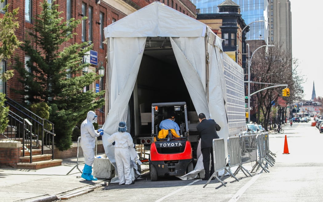 A refrigerated try with a frigurific truck is used as a morgue at The Brooklyn Hospital Center in the Brooklyn neighborhood of New York during the Covid-19 pandemic in the United States in April, 2020.