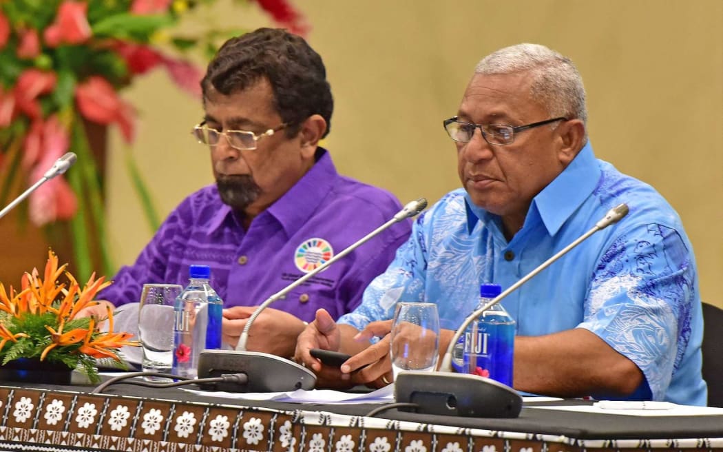 Robin Nair (L) when he was Permanent Secretary for Foreign Affairs, and Fiji Prime Minister Frank Bainimarama at preparatory talks for the UN Oceans Conference, March 2017
