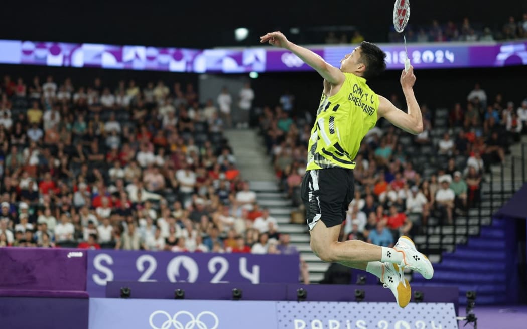 (240802) -- PARIS, Aug. 2, 2024 (Xinhua) -- Chou Tien-Chen of Chinese Taipei executes a smash during the badminton men's singles quarterfinal against Kakshya Sen of India at the Paris 2024 Olympic Games in Paris, France, Aug. 2, 2024. (Xinhua/Jia Haocheng) (Photo by Jia Haocheng / XINHUA / Xinhua via AFP)