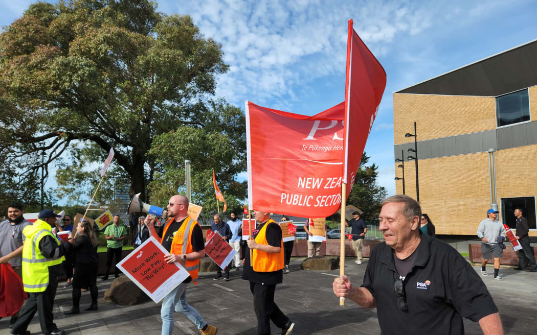 About fifty Community Corrections workers demonstrating outside the Manukau District Court in Auckland.