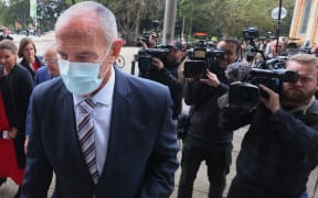 Chris Dawson and team arrive at NSW Supreme Court on August 30, 2022 in Sydney, Australia.
