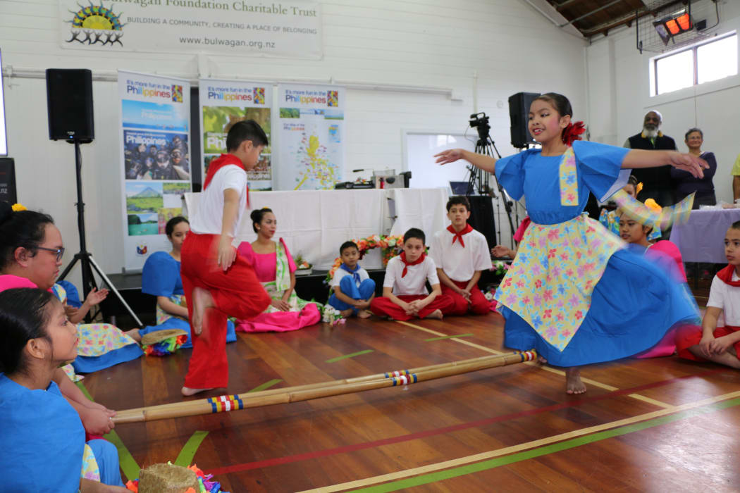 Filifest Dance Group, 10 year old Ella and Miguel perform Tinikling