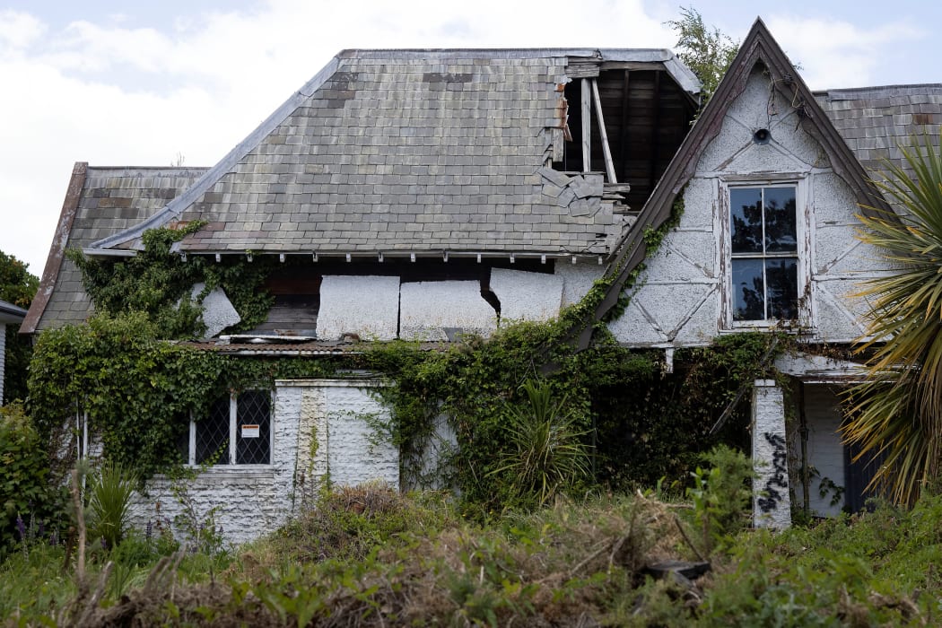 An old abandoned building on Fitzerald Avenue on the edge of Christchurch, on February 17, 2021, nearly 10 years after it was damaged in a 6.3 magnitude earthquake.