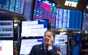 Traders work before the closing bell at the New York Stock Exchange (NYSE) on August 14, 2019 in New York City.