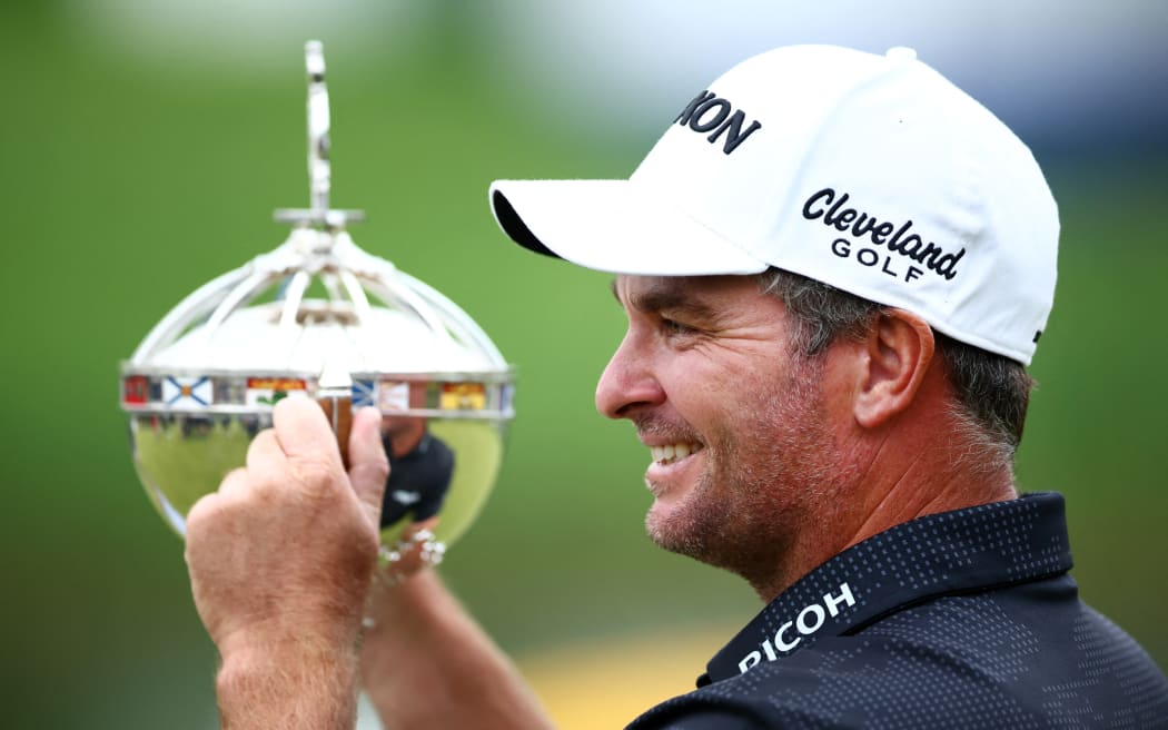 CALEDON, ONTARIO - JUNE 08: Ryan Fox of New Zealand poses with the trophy after putting in to win in a four hole playoff after the final round of the RBC Canadian Open 2025 at TPC Toronto at Osprey Valley on June 08, 2025 in Caledon, Ontario.   Vaughn Ridley/Getty Images/AFP (Photo by Vaughn Ridley / GETTY IMAGES NORTH AMERICA / Getty Images via AFP)