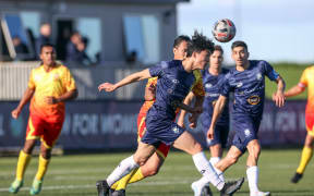Auckland City, in blue, against Nikao Sokattak