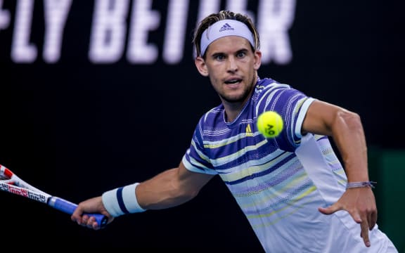 MELBOURNE, VIC - JANUARY 29: Dominic Thiem of Austria returns the ball during the quarterfinals of the 2020 Australian Open on January 29 2020, at Melbourne Park in Melbourne, Australia. (Photo by Jason Heidrich/Icon Sportswire)