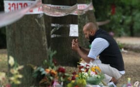 A man faces the Masjid Al Noor mosque March 19, Christchurch.