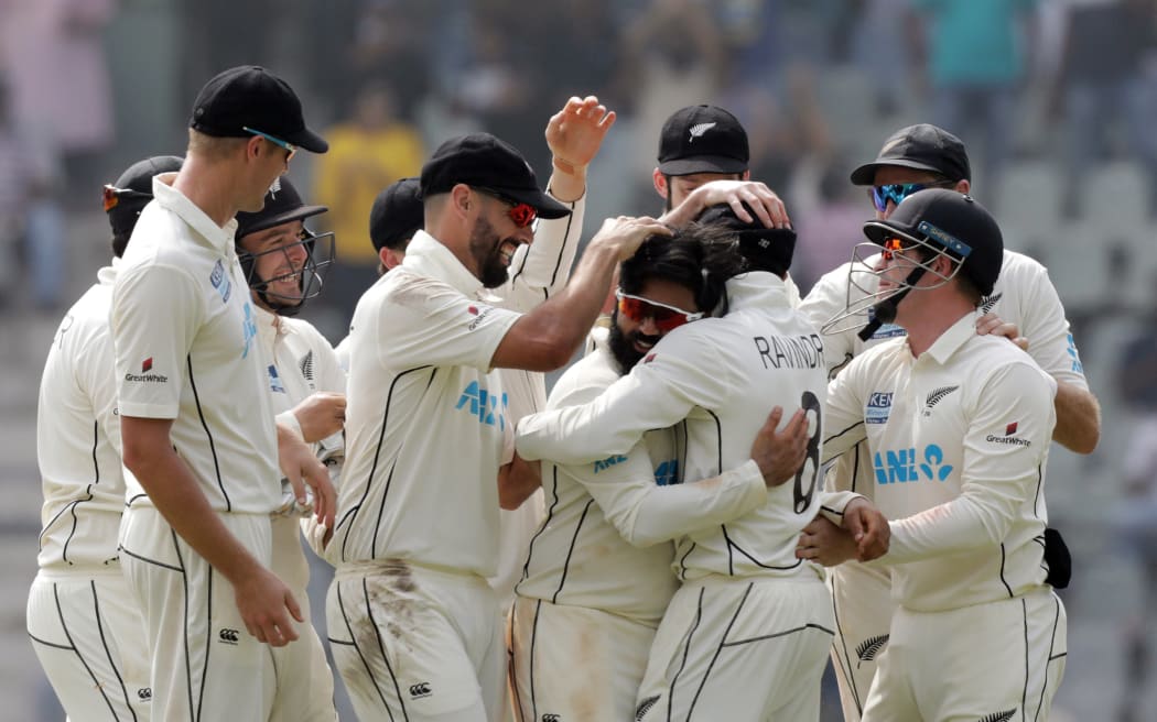Ajaz Patel of New Zealand celebrates a wicket playing against India at the Wankhede Stadium in Mumbai, 2021.