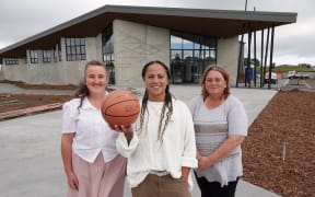 From left, Kaikohe and Districts Sportsville board secretary Debbie Raphael, sports coordinator Kohi Woodman and co-chair Suzee Ross outside the almost-completed indoor stadium.