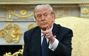 US President Donald Trump speaks during a meeting with German Chancellor Friedrich Merz in the Oval Office of the White House in Washington, DC on March 3, 2026. Chancellor Merz is the first European leader to visit President Trump since the United States and Israel launched their war against Iran.