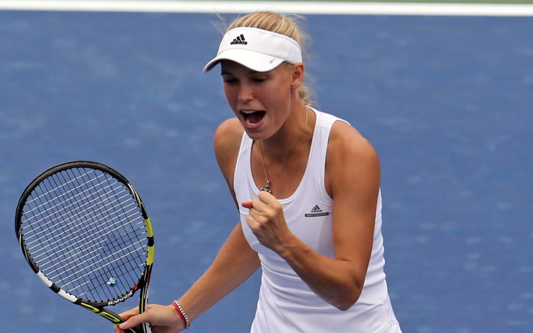 Danish tennis player Caroline Wozniacki competes. 2014.