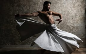 An image of Ahmad Joudeh mid-spin.
