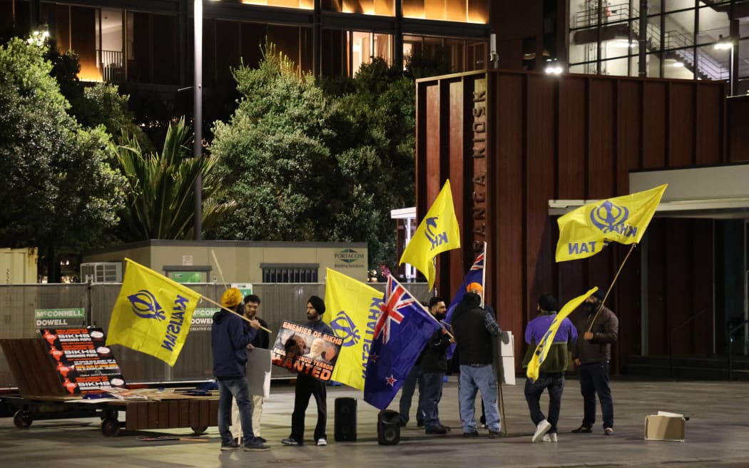 A small group of protesters gathered outside the venue to lobby for a separate state for Sikhs.