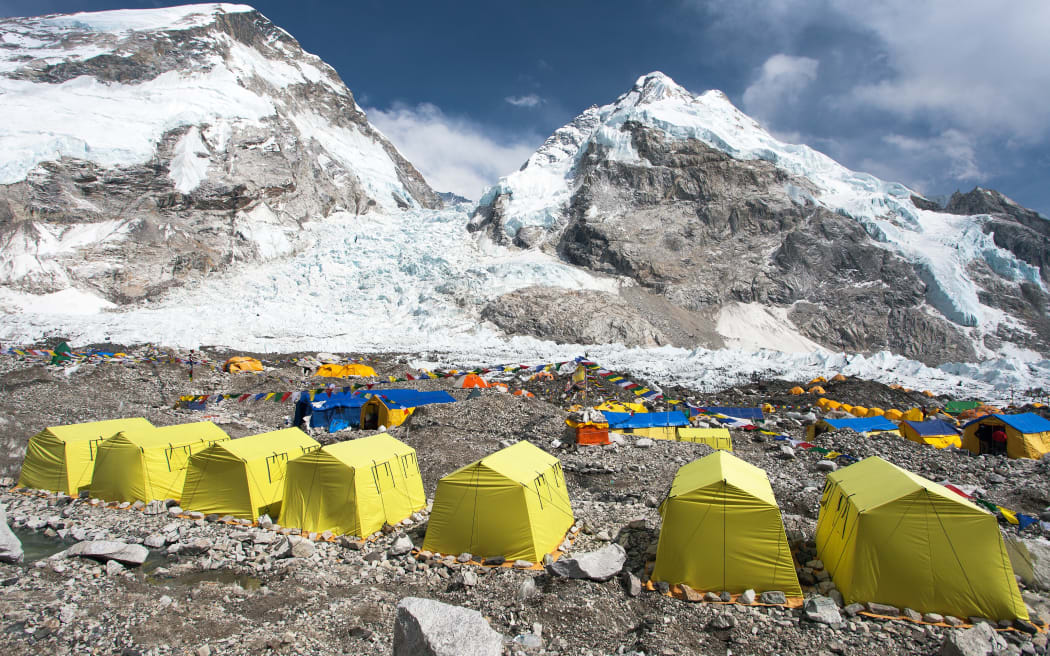 View from Mount Everest base camp, tents and prayer flags, sagarmatha national park, trek to Everest base camp - Nepal