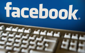 Facebook logo and keyboard