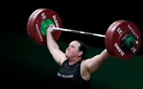(FILES) In this file photo taken on April 9, 2018, New Zealand's Laurel Hubbard competes during the women's +90kg weightlifting final at the 2018 Gold Coast Commonwealth Games in Gold Coast. -