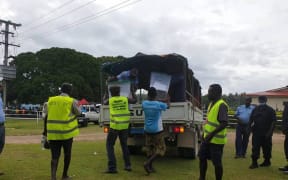 Ballot boxes being transported