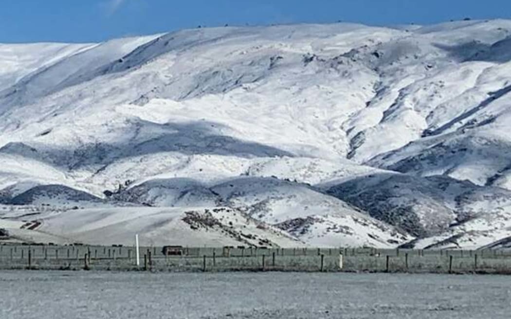 Snow covered hills at Matakanui Station, Omakau, Central Otago.