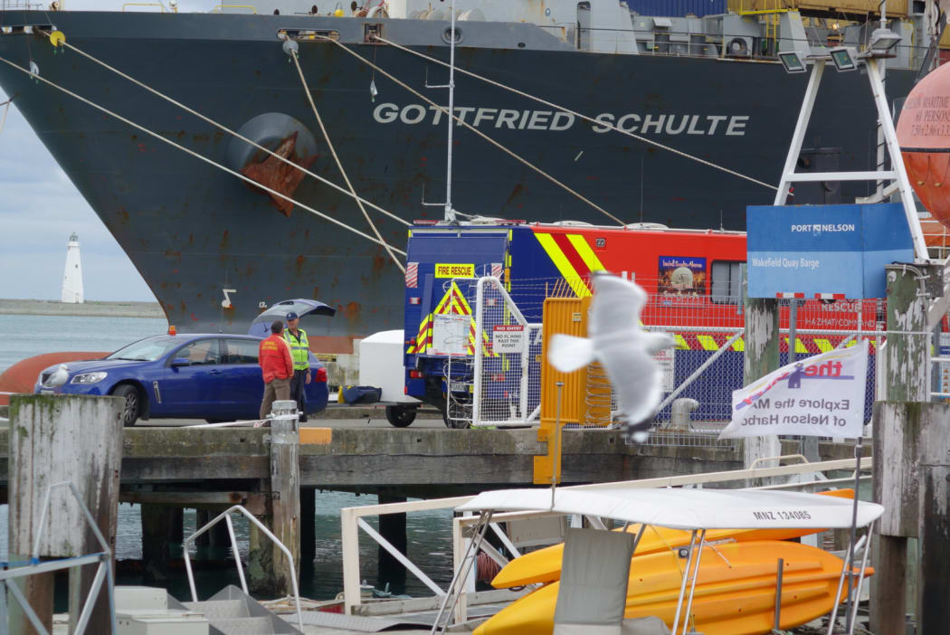 Police and emergency services are dredging the seafloor beside a wharf at Port Nelson.