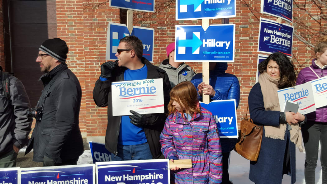Supporter holding 'Women for Bernie' sign, Concord, New Hampshire.
