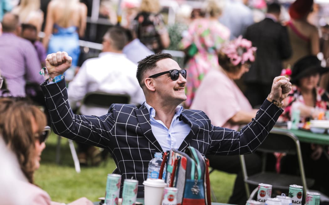 Crowds excited for New Zealand Trotting Cup at Addington Raceway in Christchurch.