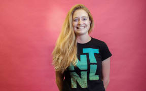 RNZ First Up producer Ellie Jay in her favourite band t-shirt - The National