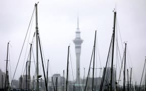 Auckland weather generic. Sky tower. Storm, rain.