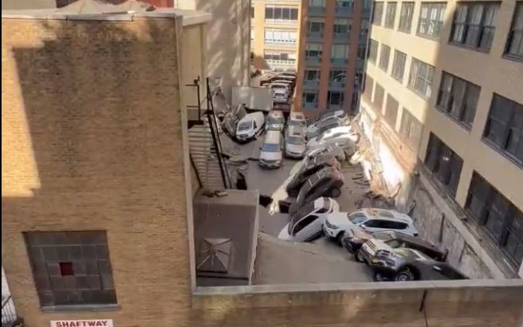 Screenshot showing the second floor of a garage structure collapsed onto the first.