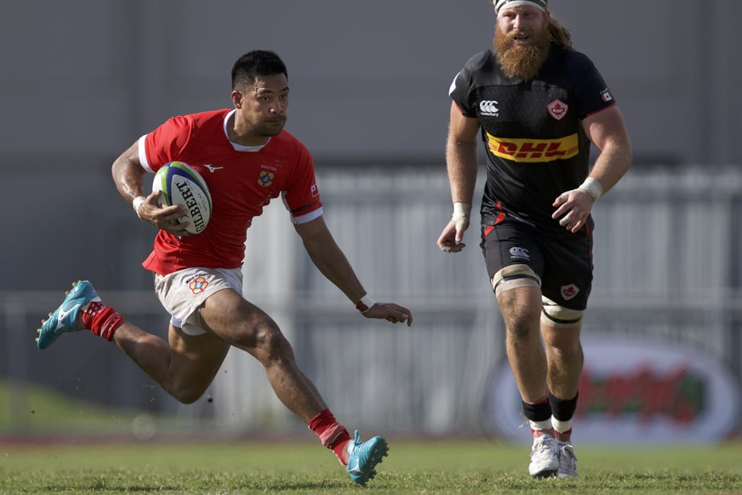 Atieli Pakalani makes a break against Canada in Lautoka