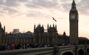 Members of the public join the queue on Westminster Bridge, as they wait in line to pay their respects to the late Queen Elizabeth II, Lying-in-State in the Palace of Westminster in London on 14 September, 2022.