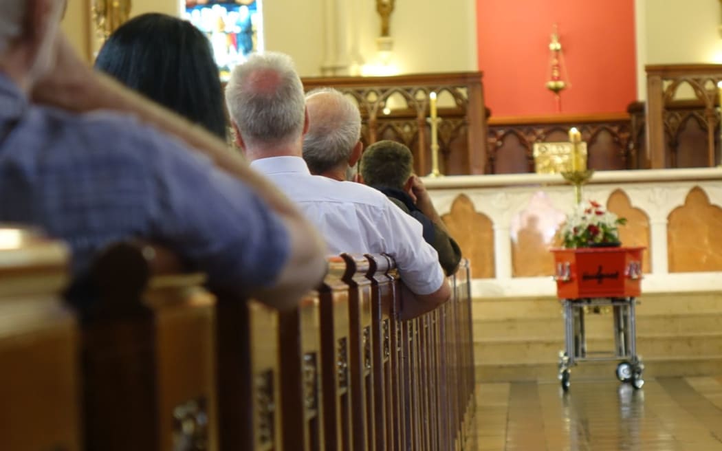 Hundreds of people gathered for the funeral of pop pioneer Ray Columbus.