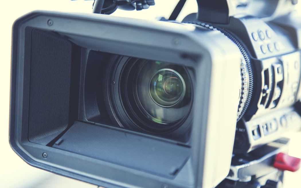 Video camera, journalism, visual journalist, media. Generic.