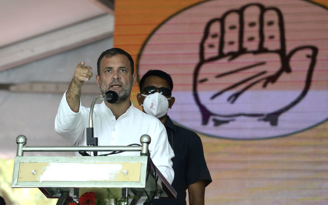 India's Congress party leader Rahul Gandhi gestures as he addresses a public rally ahead of the Tamil Nadu state legislative assembly elections, in Chennai on March 28, 2021.