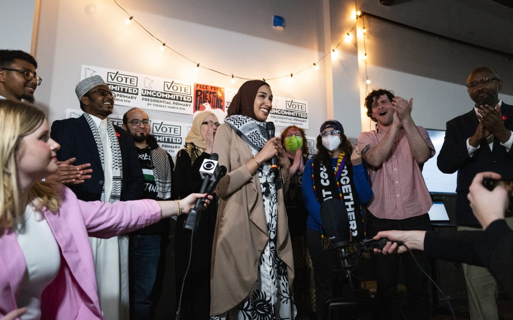 Asma Mohammed (centre), an activist with Uncommitted Minnesota, during a watch party for the presidential primary in Minneapolis, in March. The group organized people to vote “uncommitted” in the Democratic primary election as a form of protest against the Biden administration’s handling of the war in Gaza.