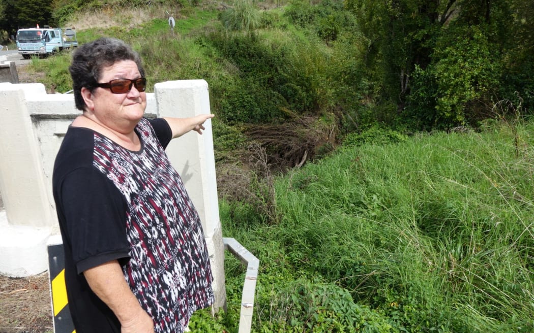 Sharon Kaipo points to debris in Mangakahia stream.