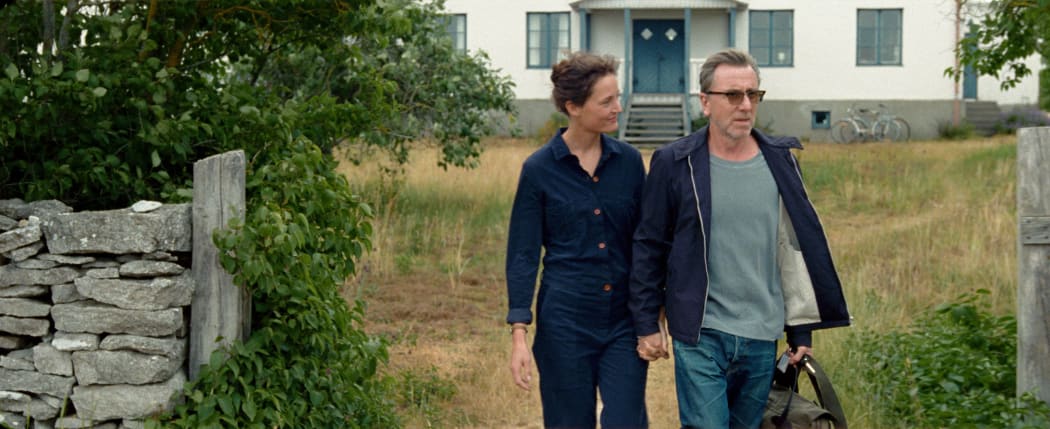 Tim Roth and Vicky Krieps in Bergman Island (2021).
