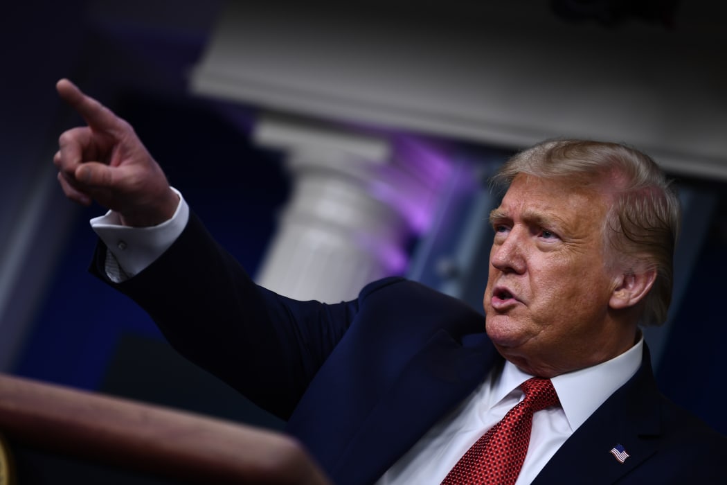 US President Donald Trump speaks to the press in the Brady Briefing Room of the White House in Washington, DC, on August 10, 2020.
